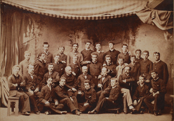 Photograph (dated 1 June 1882) of a group of students and teachers of the 3A Class of the High school "Marco Foscarini" State Gymnasium. The fourth student standing from the right is Guido Castelnuovo (the third in the middle row, with the dark jacket behind the professor with a moustache), son of Enrico Castelnuovo. Antonio Sorgato/Università Ca' Foscari Venezia Archivio Storico 