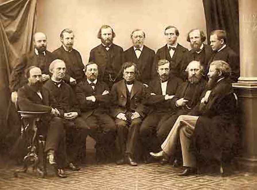 Professors of the Physics and Mathematics Faculty of St. Petersburg University (1868). From L to R, sitting : A.V. Sovetov (agriculture), P.L. Chebyshev, K.F. Kessler (zoology), A.N. Savich (astronomy), P.A. Puzyrevsky (geology), F.V. Ovsyannikov (anatomy), A.N. Beketov (botanics). Standing: R.E. Lentz (physics), N.A. Menshutkin (chemistry), A.S. Famintsyn (physiology), I.I. Somov (mathematics), F.F. Petrushevsky (physics), D.I. Mendeleev (chemistry), A.N. Korkin (Mathematics)