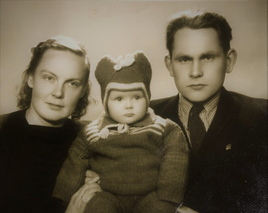 With parents in 1955