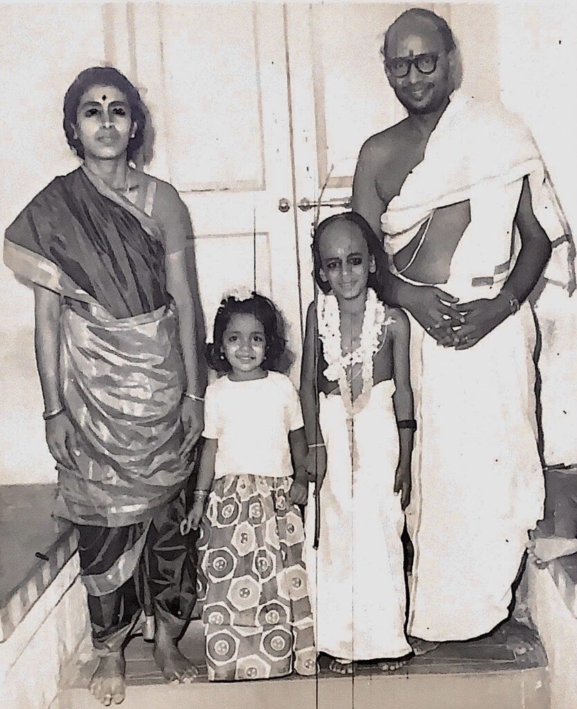 With his parents Prema and Krishnamurthi, and sister Srividya