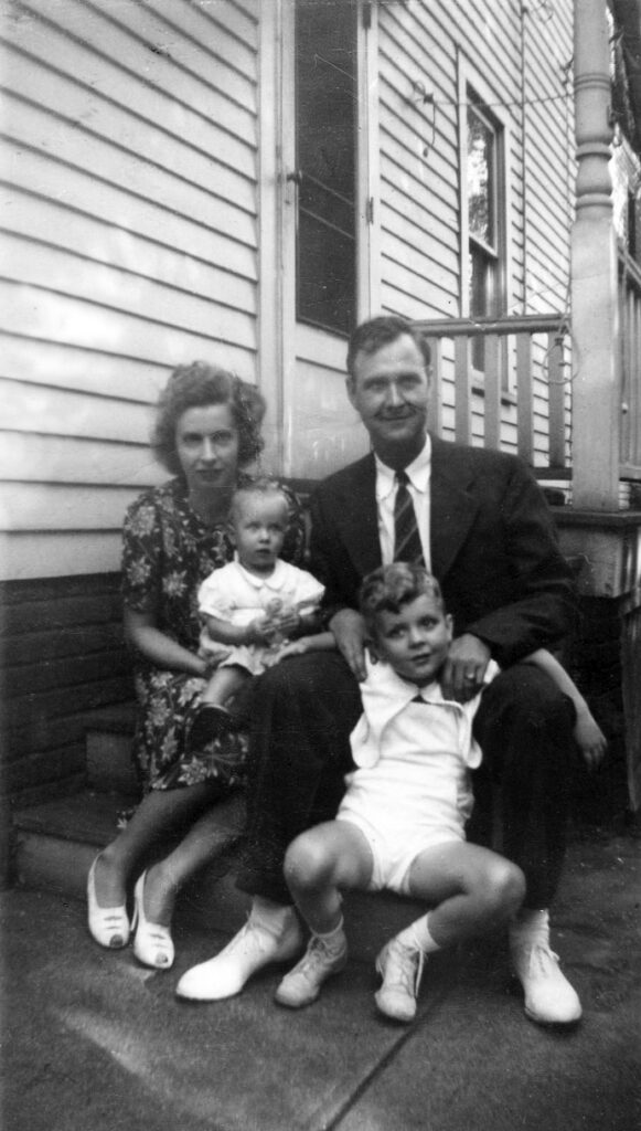 Parents Ervin and Louise, holding Don and sister Paula respectively; May 1942