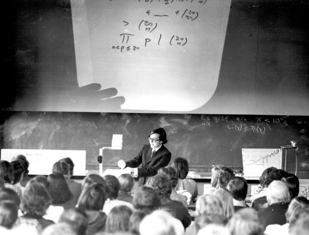Giving his “Antrittsvorlesung” (inaugural lecture) “The First 50 Million Prime Numbers”, on the occasion of his Habilitation at age 23.