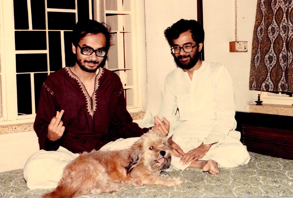 Ashoke and his brother with their pet