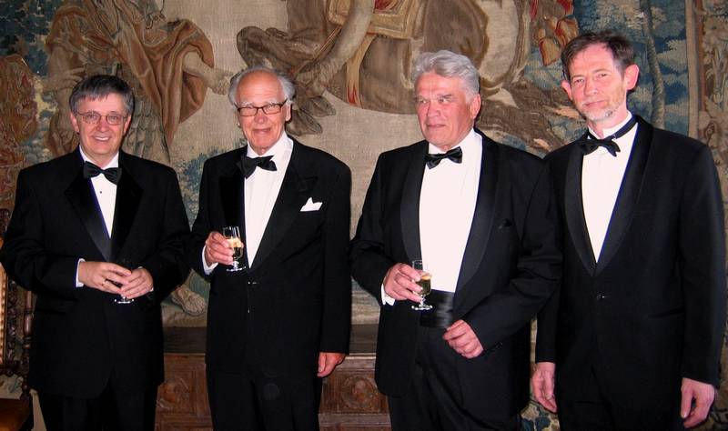 Four former IMU Presidents at the Abel Banquet in Oslo, Norway, in May 2007. From L to R: L. Lovász, L. Carleson, L. Faddeev, and J. Ball.
