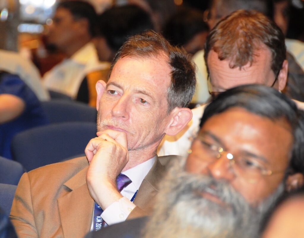 Attending a session at the ICM 2010 in Hyderabad.