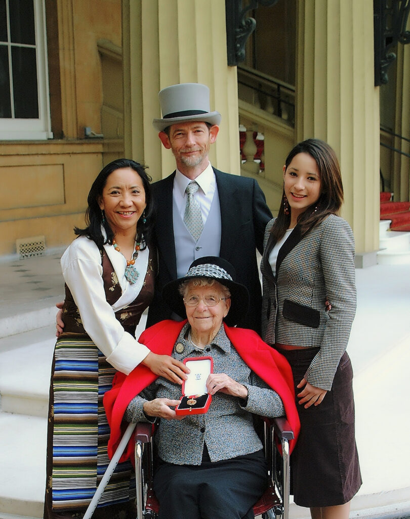  After receiving his Knighthood, with wife Sedhar, daughter Kesang and Jean Burns.