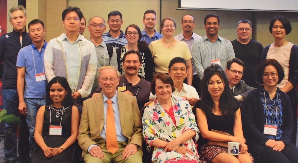 With students and postdocs. (L to R) Front row: Amita Malik (student), Berndt, Helen, Heekyoung Hahn (student), Soon-Yi Kang (student); second row: Byungchan Kim (student), Chadwick Gugg (student), Heng Huat Chan (student), Paul Bialek (student); third row: Song Heng Chan (student), Jaebum Sohn (student), Hannah Burson (student), Vicki Reuter (student), Atul Dixit (student), Doug Bowman (postdoc), Ae Ja Yee (postdoc); fourth row: Youn-Seo Choi (student), Tim Huber (student), Zhu Cao (student), Dennis Eichhorn (student), Armin Straub (postdoc).